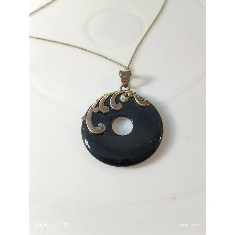 Black Donut Pendant Necklace in Wire-Wrapped Silver & Gold Motif